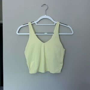 Pale yellow sports bra tank